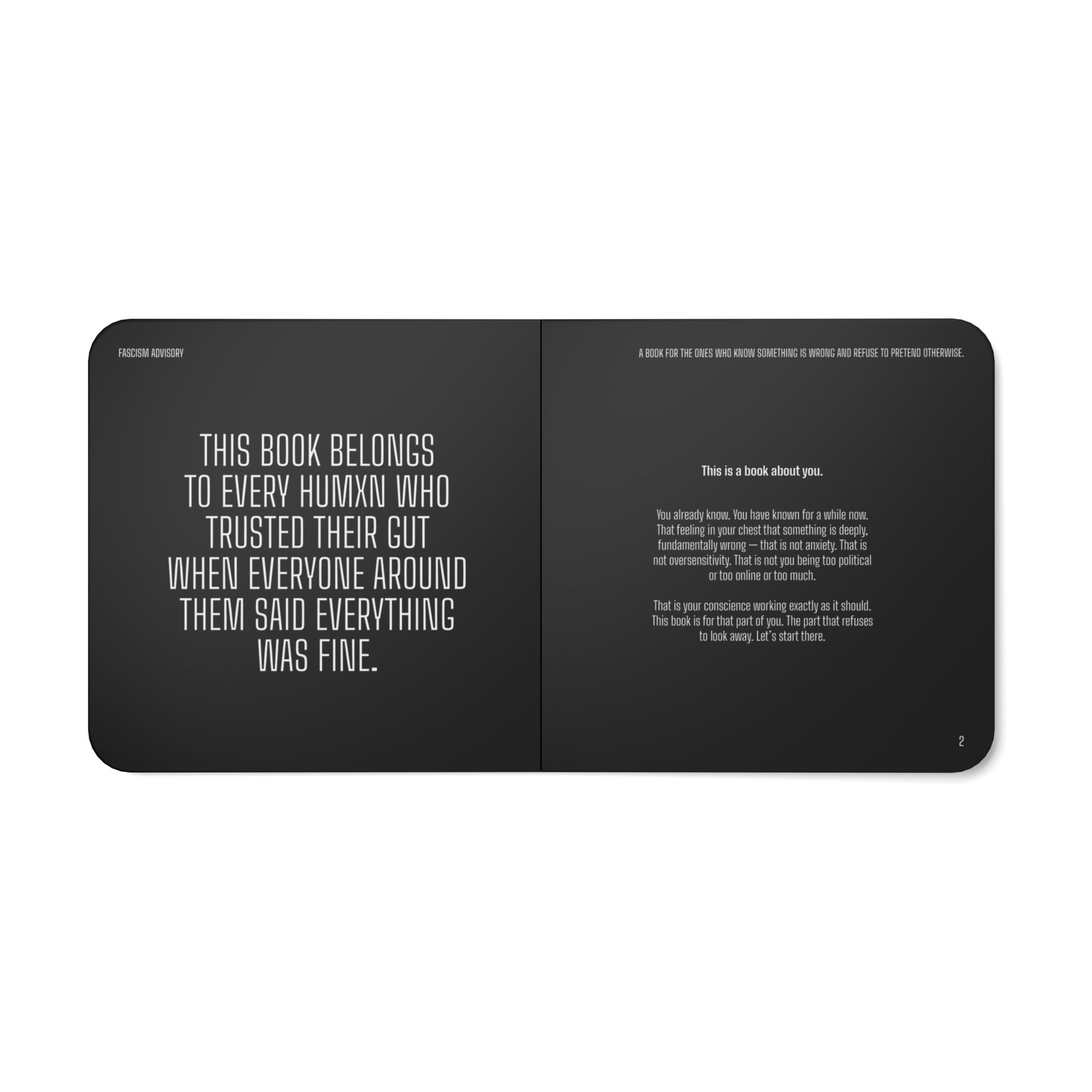 8973304147044749693_2048jpeg ⟢ Anarchyland Two page book spread left page has large vertical white text right page has smaller paragraph text page number 2 in corner