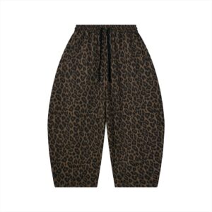 Leopard print jogger pants with elastic waist and black drawstring drawcords.