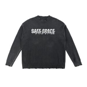 Dark knit sweater with 'SAFE SPACE' printed in white across the chest
